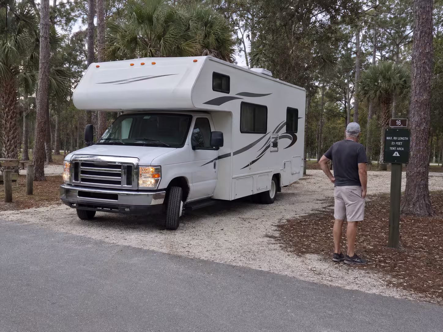 Small Class C motorhome pulling into a Broward County campsite