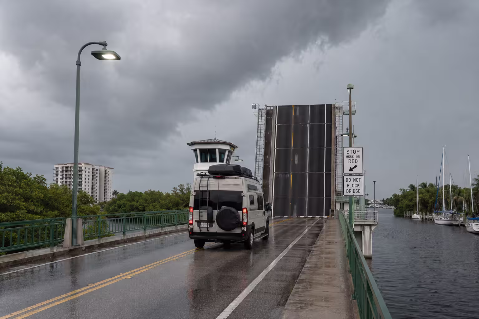 Compact camper van crossing an Intracoastal bridge in Ft. Lauderdale