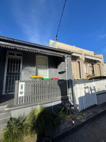 Leichhardt terrace street frontage with the repaired overhead service cable