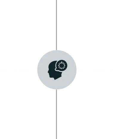 Icon of a human head silhouette with a loading or processing symbol inside the brain area, centered on a gray circular background.