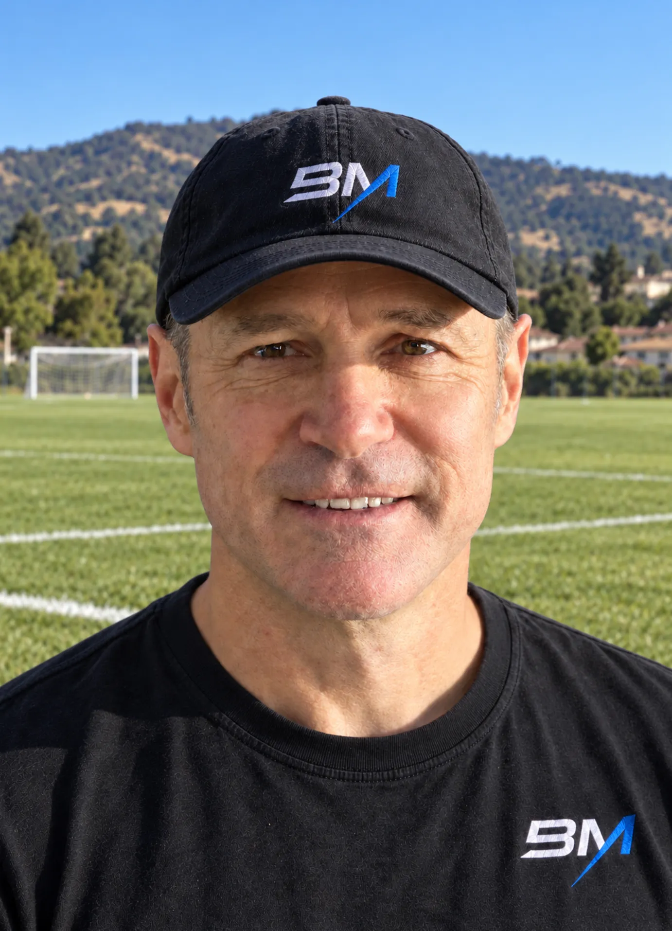 Evan McKay, founder of Beyond Motion, on a soccer field
