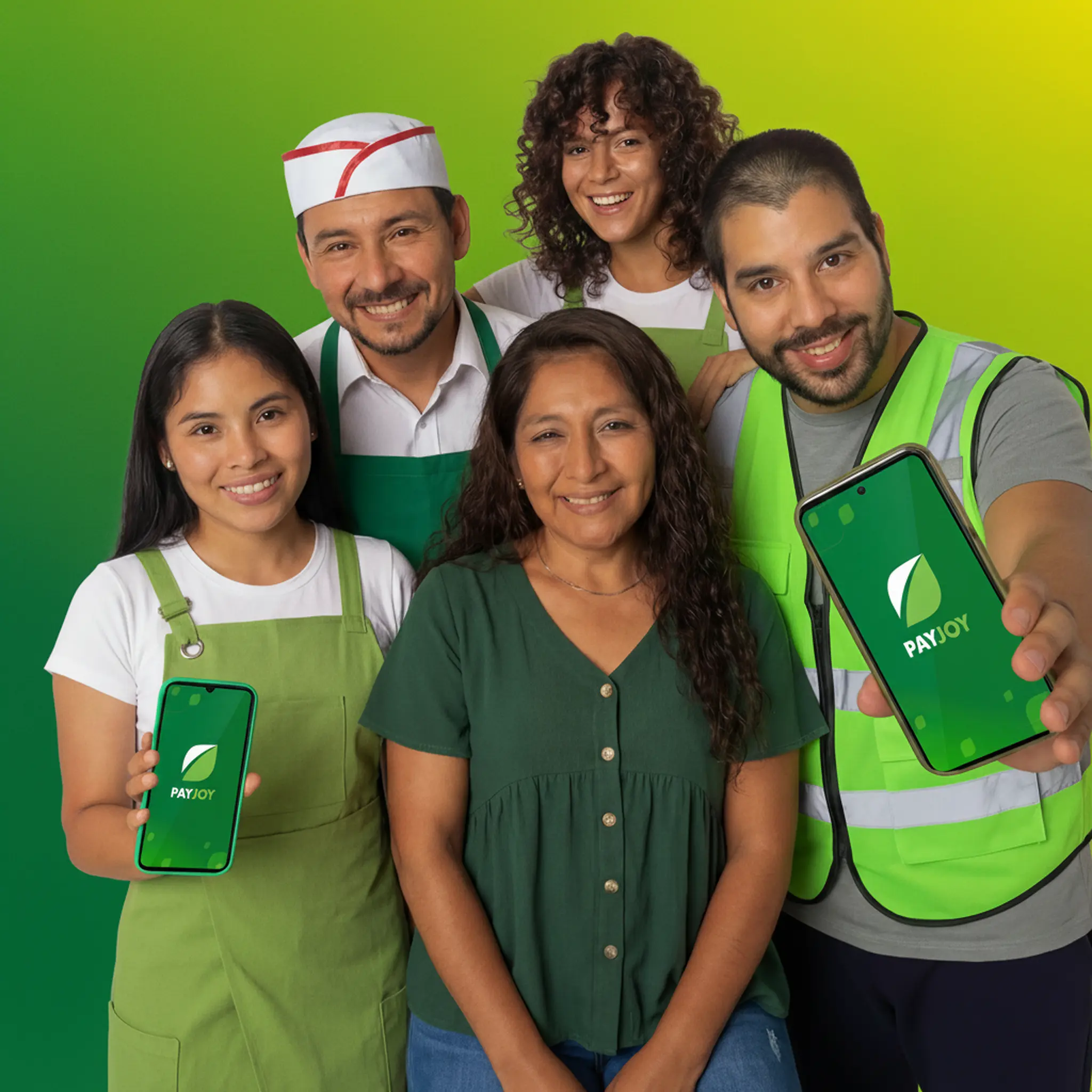 Five smiling diverse workers wearing green outfits and showing smartphones with PayJoy app logo.