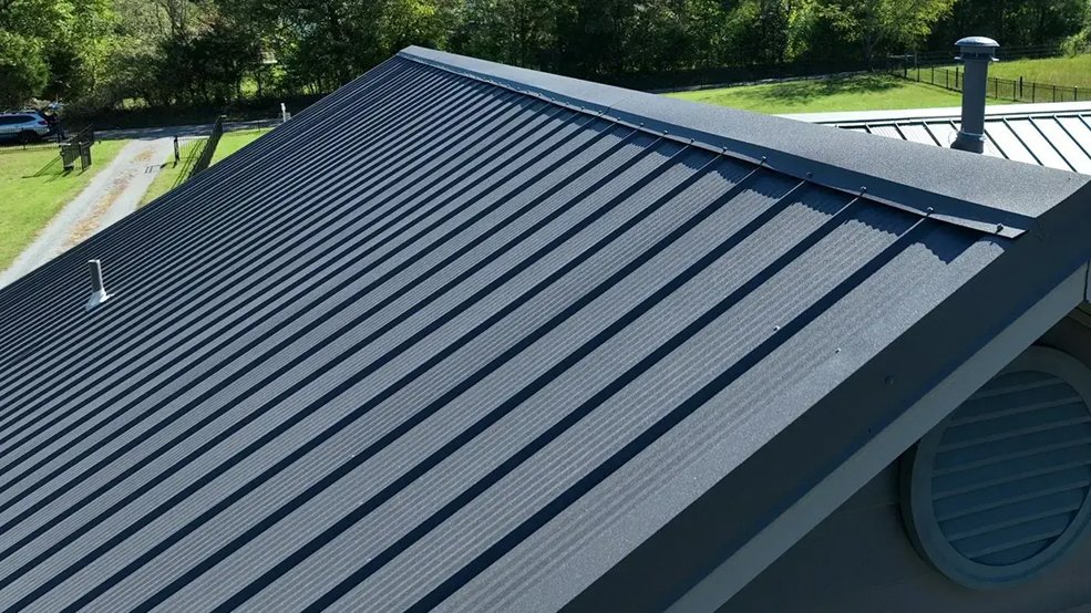 Charcoal textured classic wave metal roofing on a house in Murfreesboro, TN