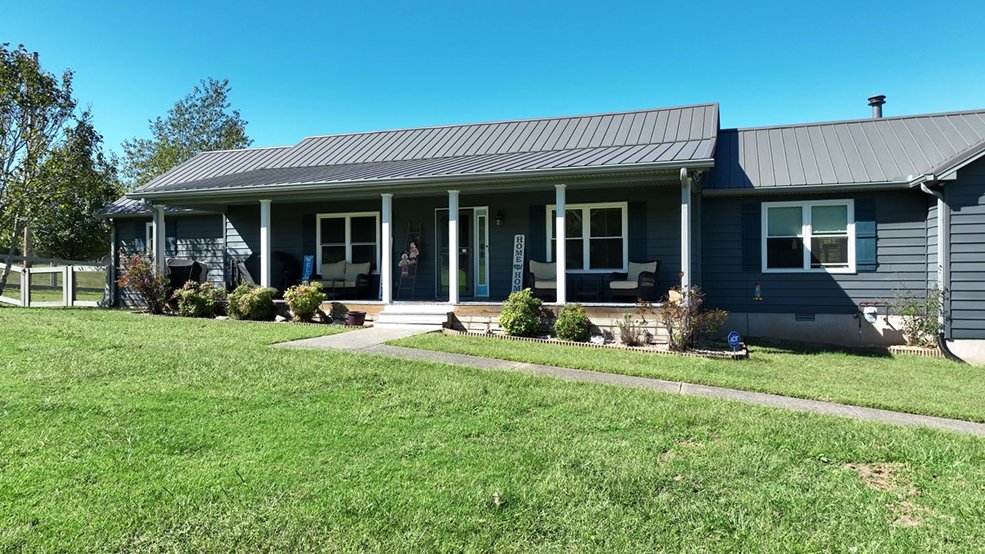 Charcoal textured classic wave metal roof and eave in Murfreesboro, Tennessee
