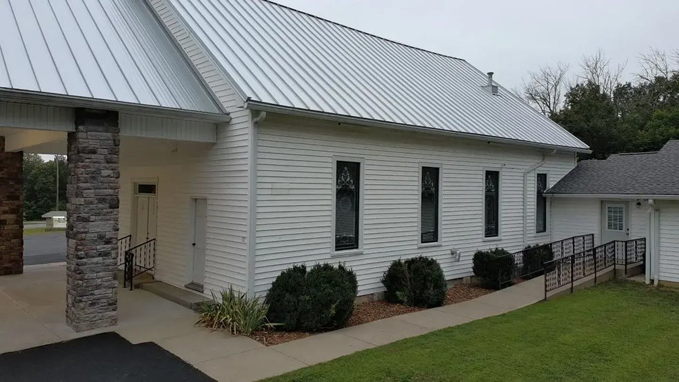 Silver standing seam roof and ridge cap on a church in Shelbyville, TN