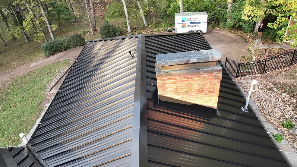 Black standing seam metal roof on a ranch home in Mt. Juliet, Tennessee