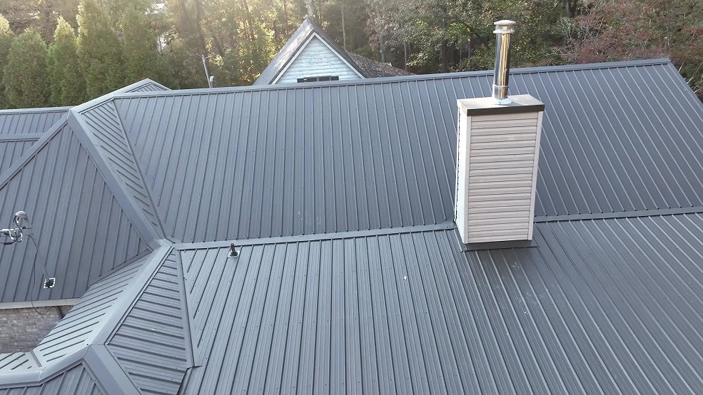 Gray standing seam metal roof and deck framing in Nolensville, TN
