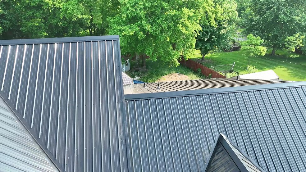 Black classic panel metal roof and brick elevation in Hendersonville, TN