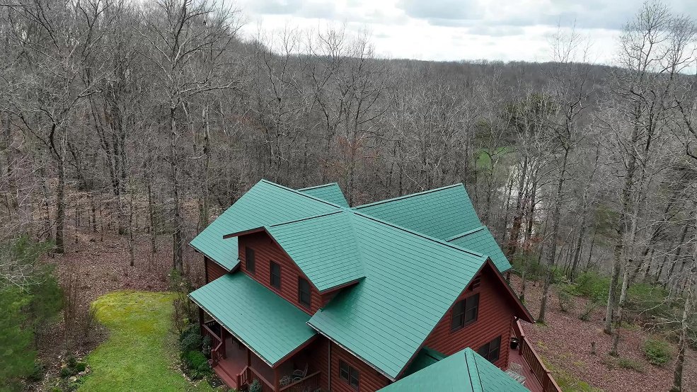 Black aluminum metal shingle roof with solar panels in Thompson's Station, Tennessee