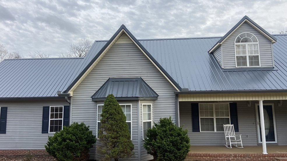 Blue classic panel metal roof and gable end in Portland, TN