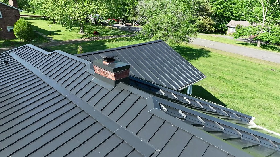 Blue classic panel metal roof on a Tennessee home in Portland