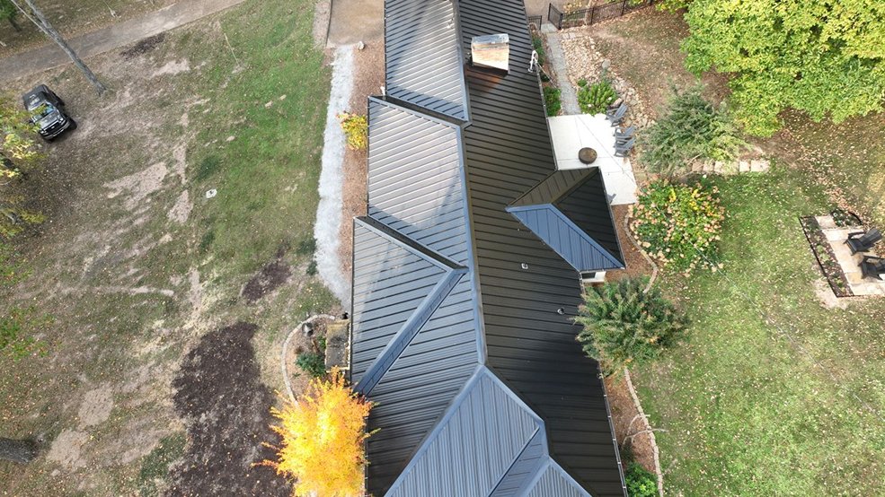 Black standing seam panels and ridge on a ranch home in Mt. Juliet, TN