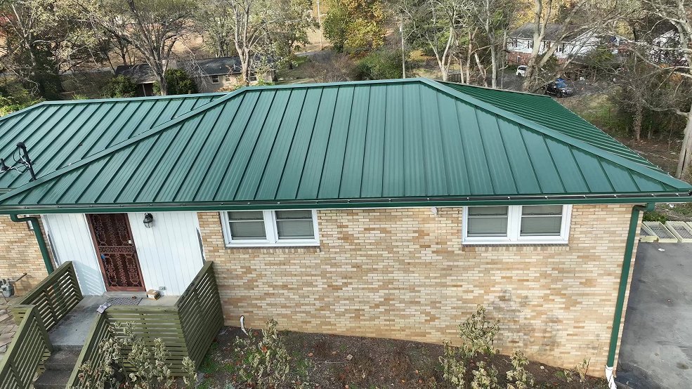 Side elevation of a black standing seam metal roof on a ranch home in Mt. Juliet, Tennessee