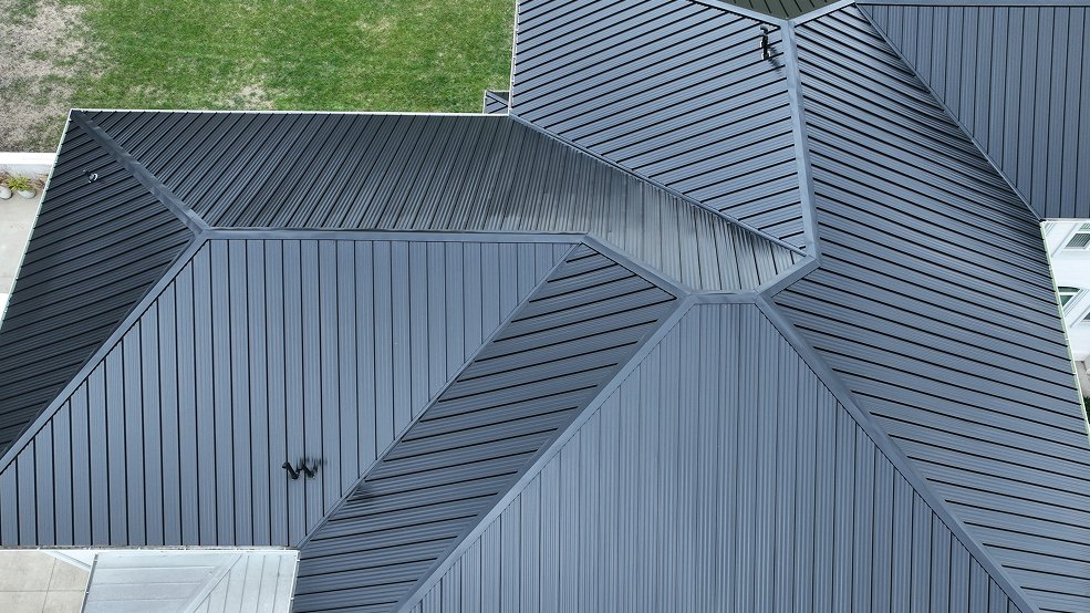 Blue classic panel metal roof and covered entry in Portland, Tennessee