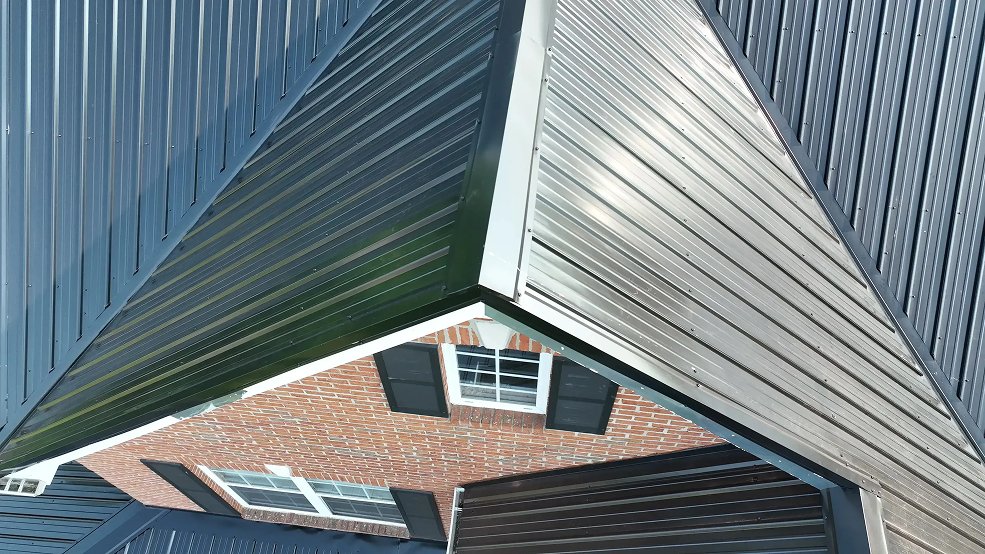 Black classic panel metal roof above brick and trim in Hendersonville, TN