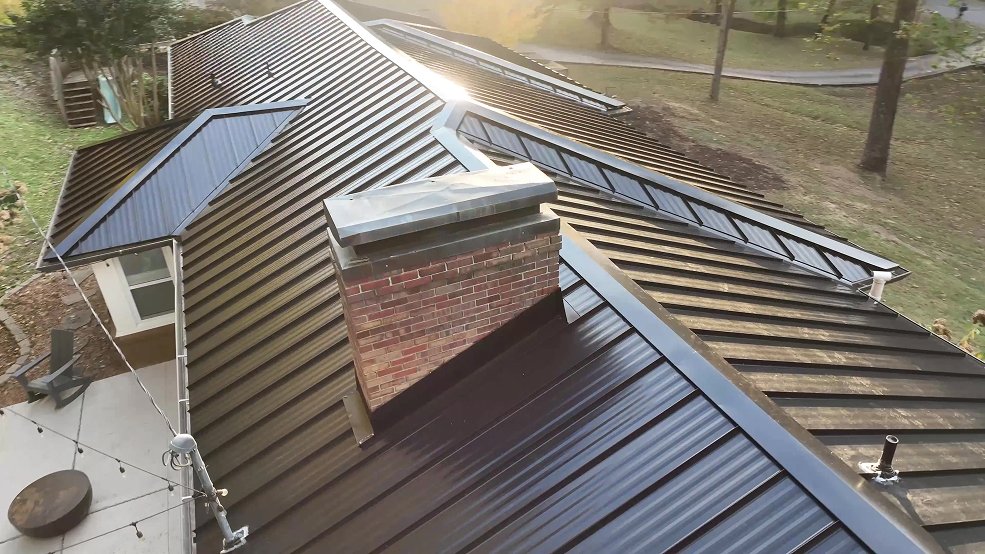 Black standing seam metal roof and front elevation of a ranch home in Mt. Juliet, TN