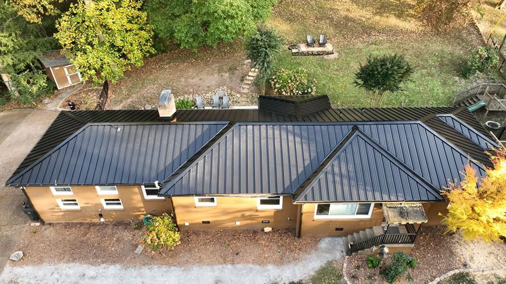 Black standing seam metal roof across a ranch home in Mt. Juliet, Tennessee