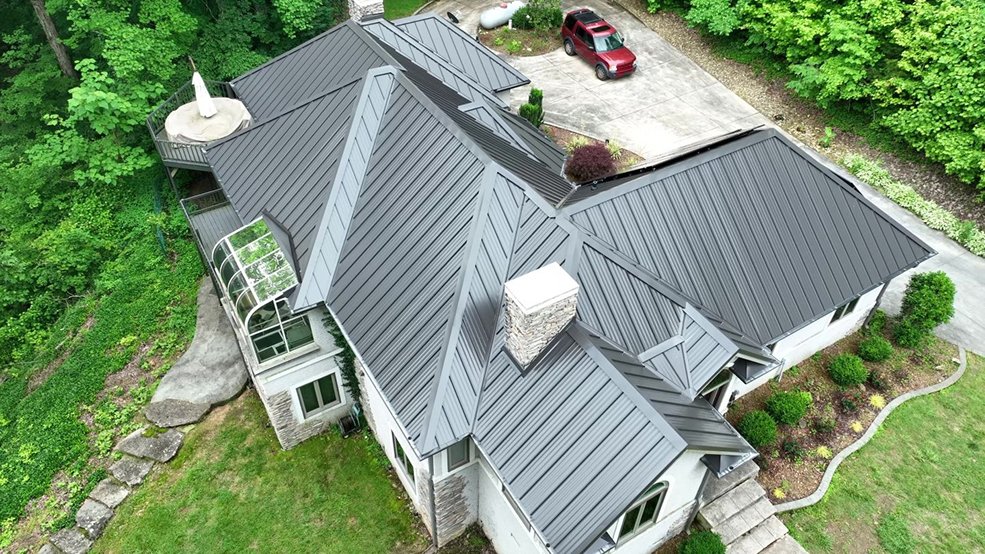 Standing seam metal roof with a rooftop solar panel system in Antioch, Tennessee