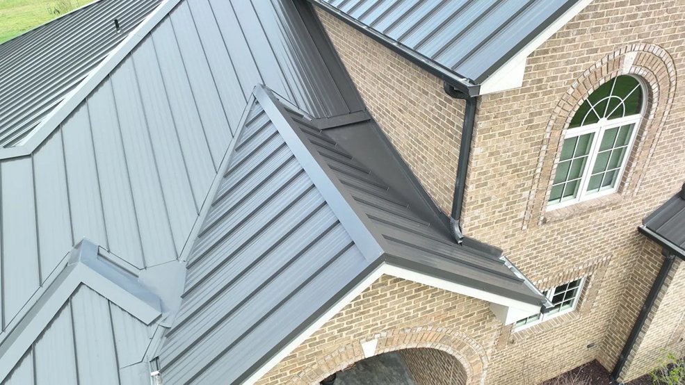 Bronze standing seam metal roof over an estate wing in Belle Meade, TN