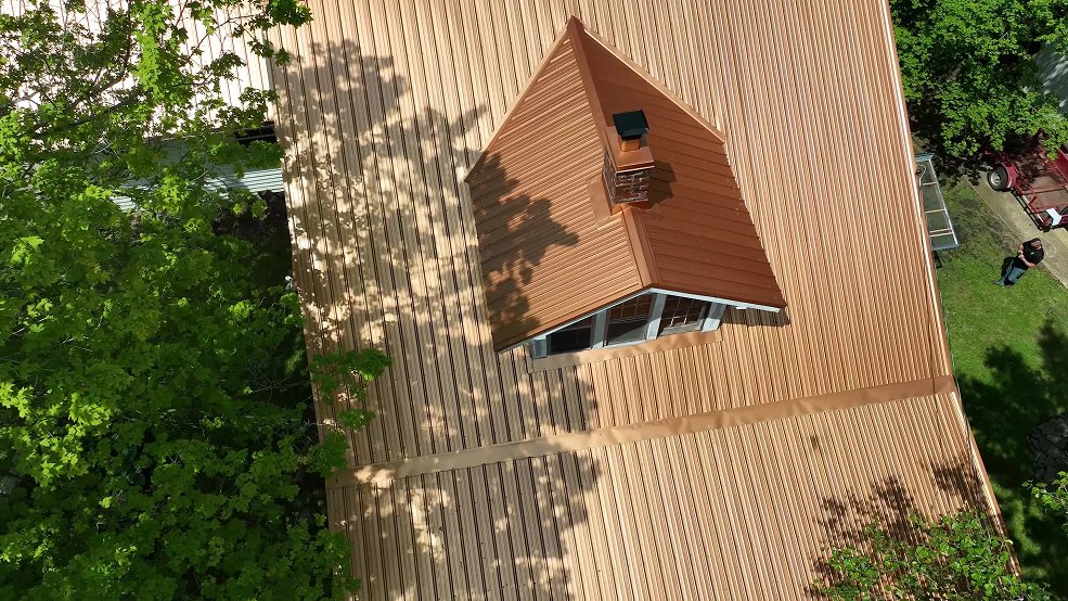 Bronze classic panel metal roof and eave in Clarksville, Tennessee