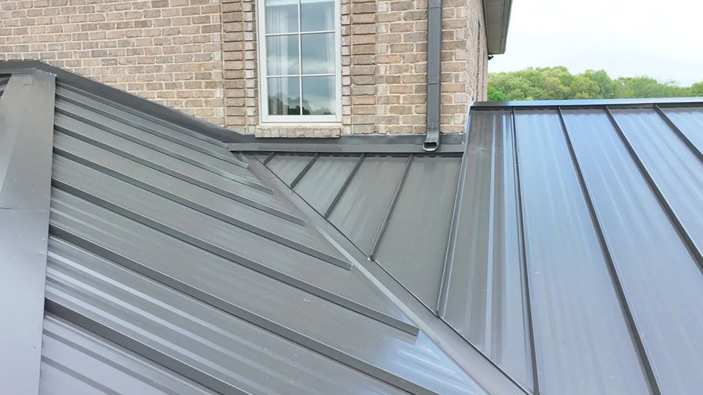 Bronze standing seam roof and chimney detail on an estate in Belle Meade, TN