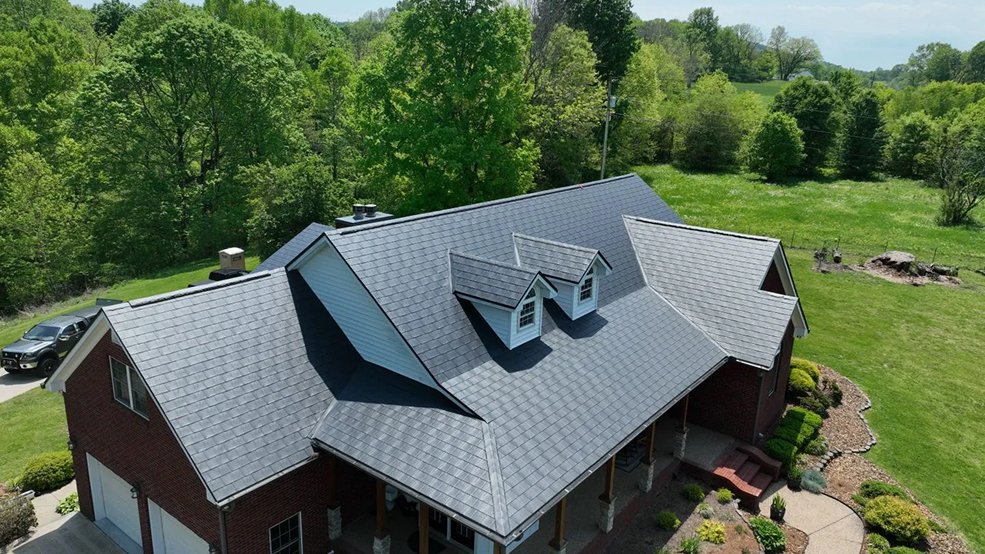 Solar panel system on a black aluminum shingle roof in Germantown, Tennessee