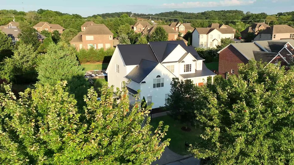 Black aluminum metal shingle roof on a family home in Germantown, TN