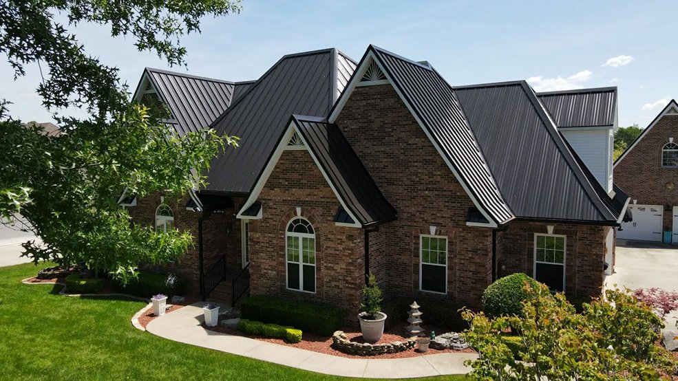 Black standing seam metal roof with sharp clean lines on a home in Brentwood, Tennessee
