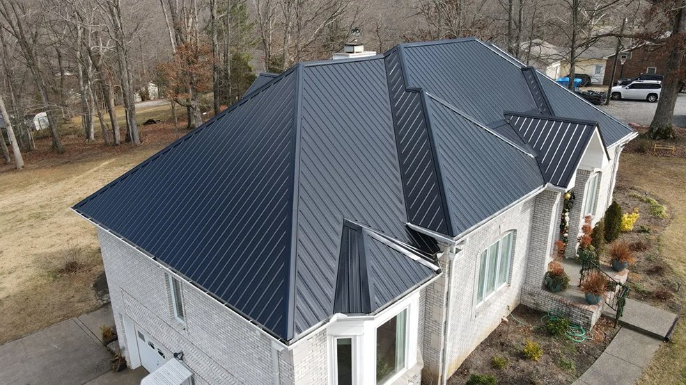 Black standing seam metal roof on a ranch home in Mt. Juliet, TN