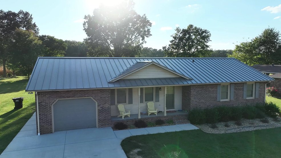 Gray standing seam metal roof on a farm ranch home in Lebanon, Tennessee