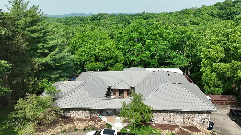 Bronze standing seam metal roof and courtyard elevation in Belle Meade, TN