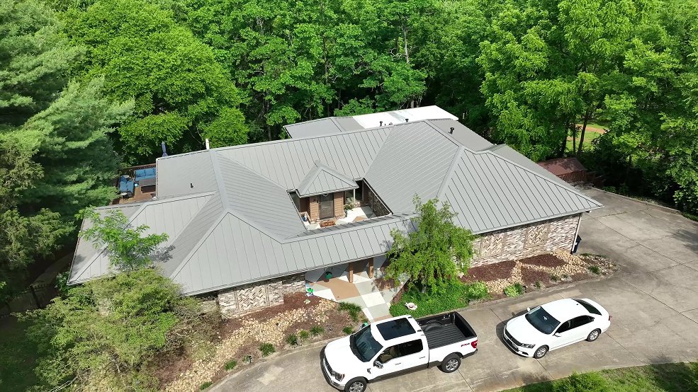 Bronze standing seam metal roof over a courtyard home in Belle Meade, TN