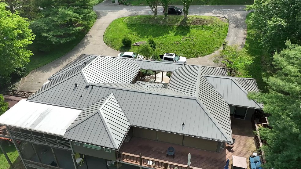 Bronze standing seam panels and valley detail on a courtyard home in Belle Meade, Tennessee