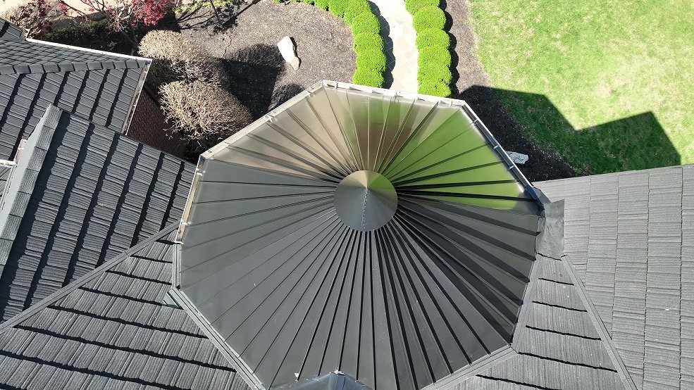 Custom metal shingle roof and tower on a cottage home in Franklin, TN