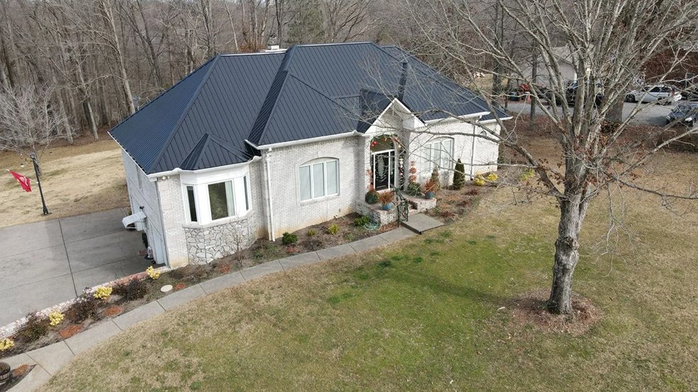 Black standing seam metal roof across a ranch home in Mt. Juliet, TN