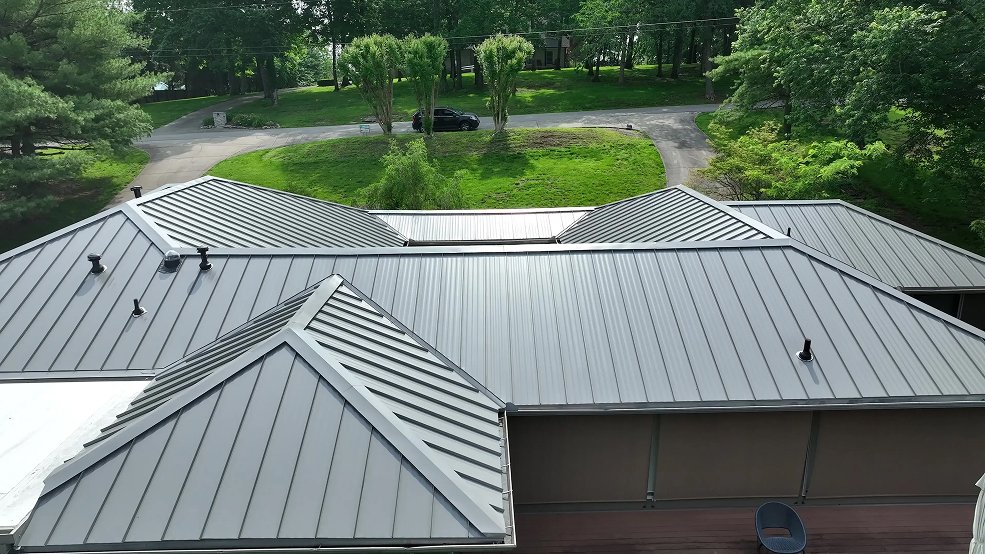 Bronze standing seam metal roof and courtyard entry in Belle Meade, Tennessee