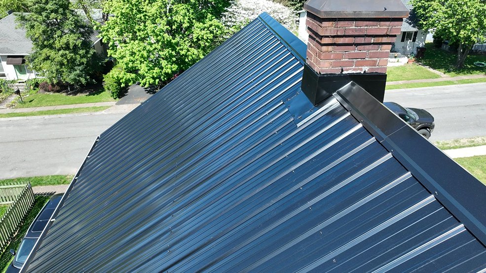 Black classic panel metal roof and trim detail in Middle Tennessee