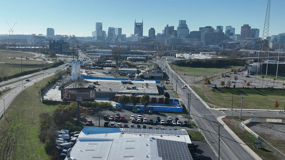 Metal roof coating applied and solar panels reinstalled on a Middle Tennessee building
