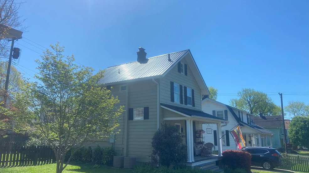 Black classic panel metal roof on a Middle Tennessee building