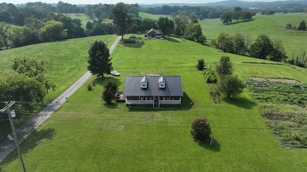 Black standing seam metal roof panels in full sun