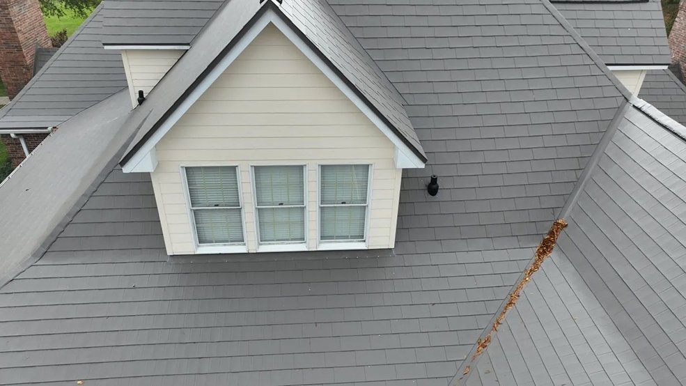 Metal shingle roof on a brown home in Murfreesboro, Tennessee