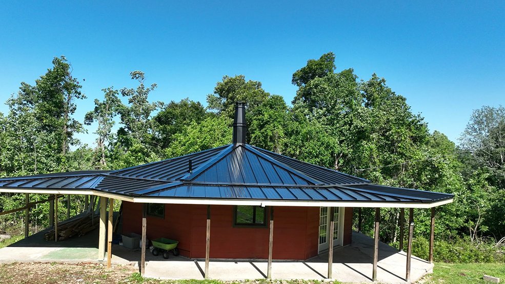 Black standing seam metal roof on a low profile home in Nolensville, TN