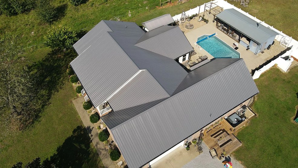 Gray standing seam metal roof panels and seams