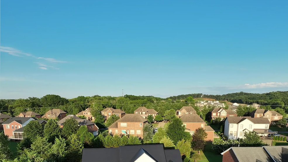 Wide view of a metal shingle roof on a Tennessee home
