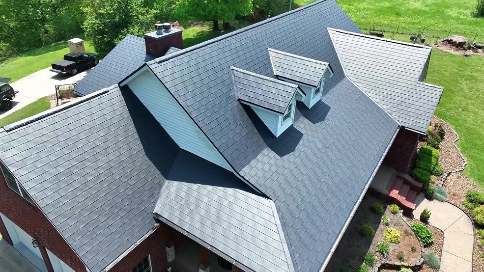 Metal shingle roof panels and edge detail