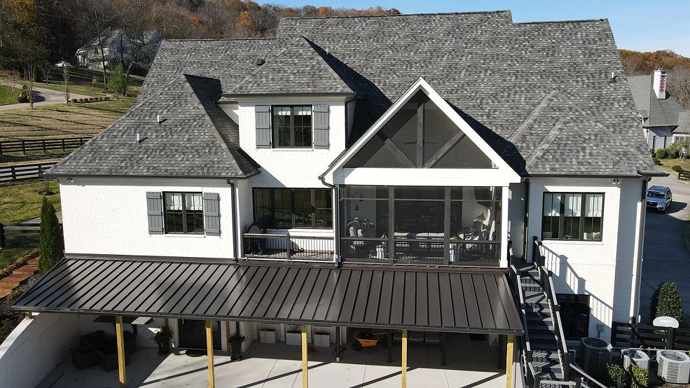 Standing seam metal roofing installed over one section of a Tennessee roof
