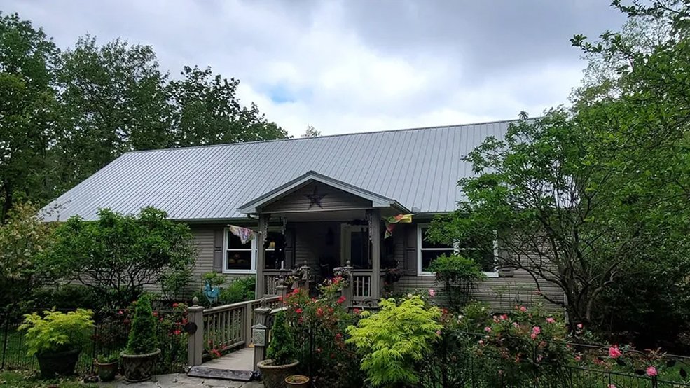 Gray traditional exposed fastener metal roof panels