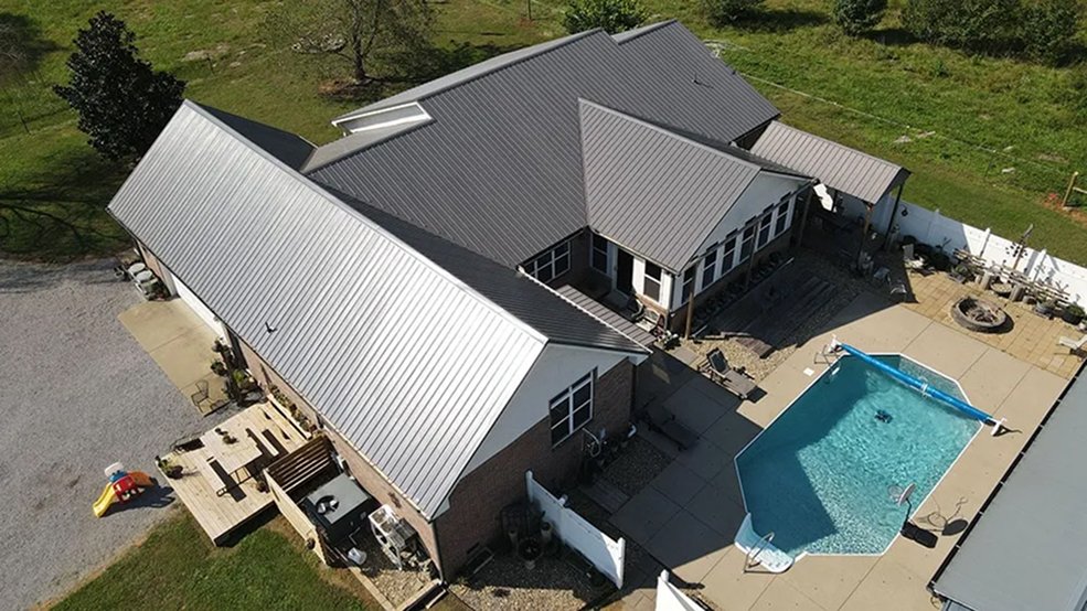 Gray traditional exposed fastener metal roofing panels