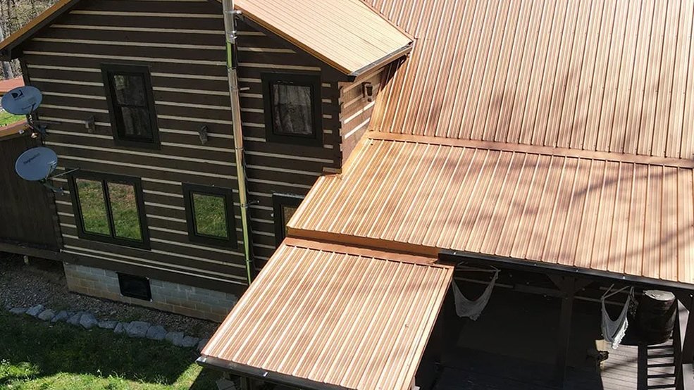 Copper traditional metal roof panel finish
