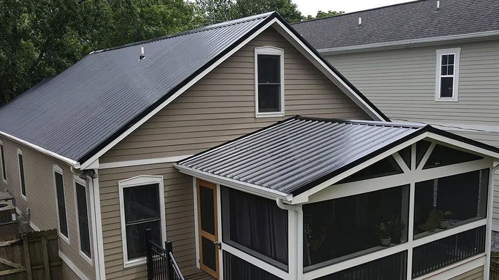 Black traditional metal roof panels and fastener line